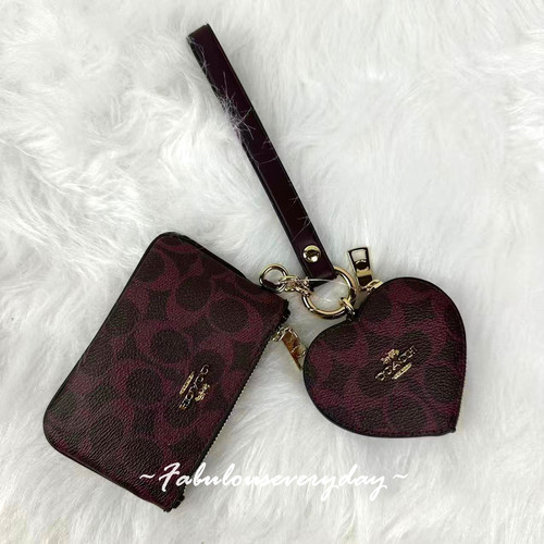Coach pochette polso e - coach,